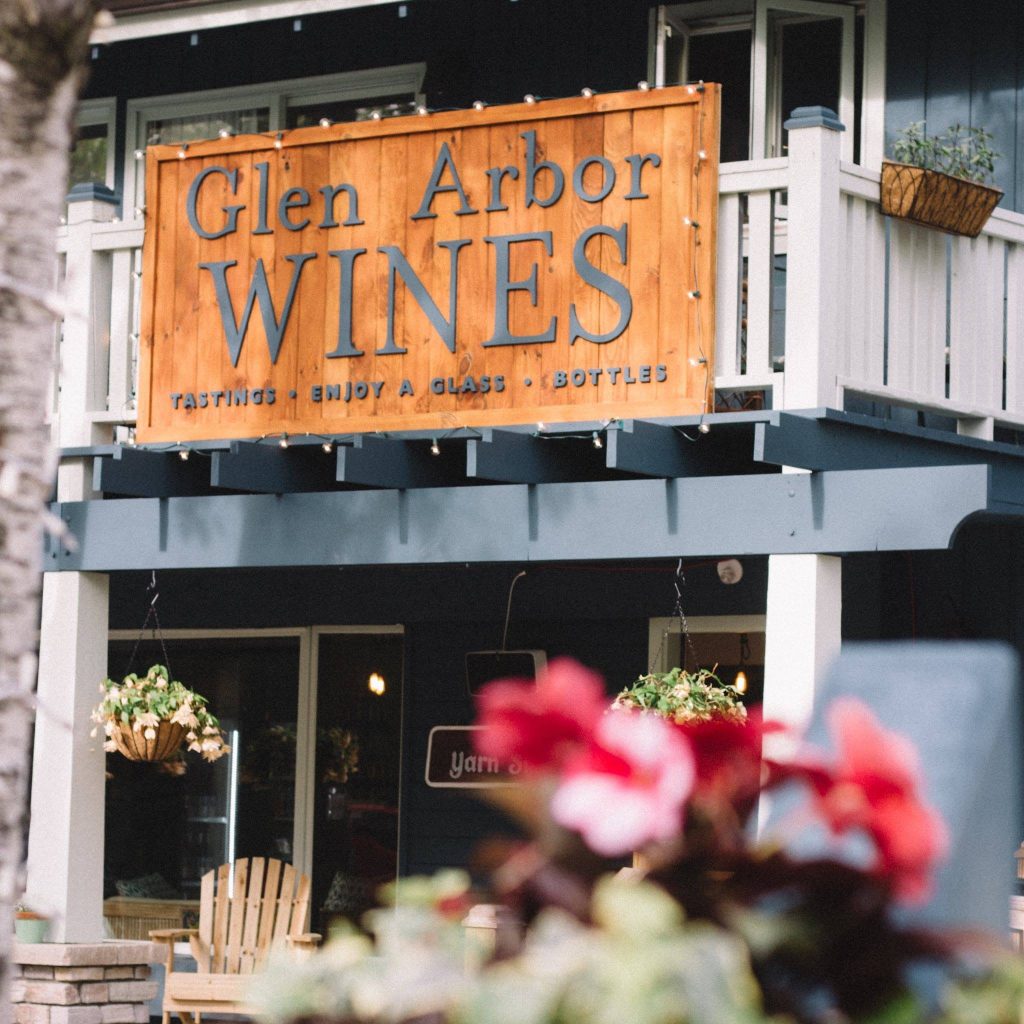 storefront sign at Glen Arbor Wines on Lake Street north of M22