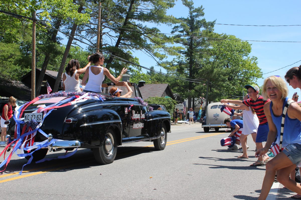 july 4th parade in glen arbor streetside view of dunesmobile
