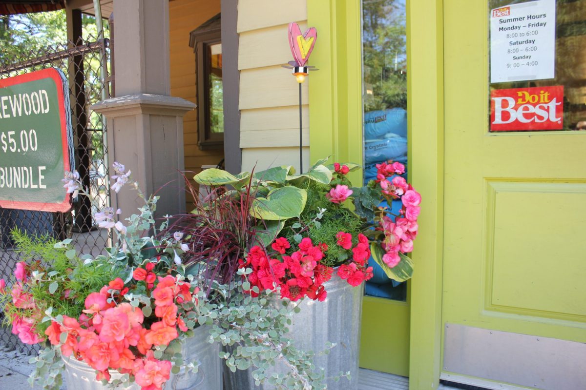 summer flowers and storefront door