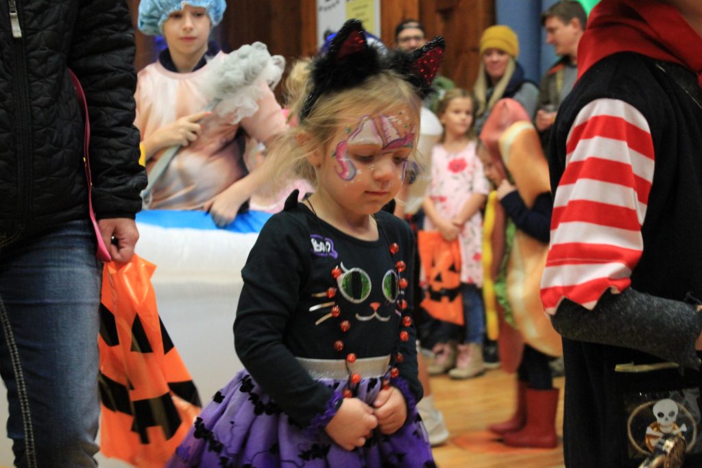 kids in halloween costume parade