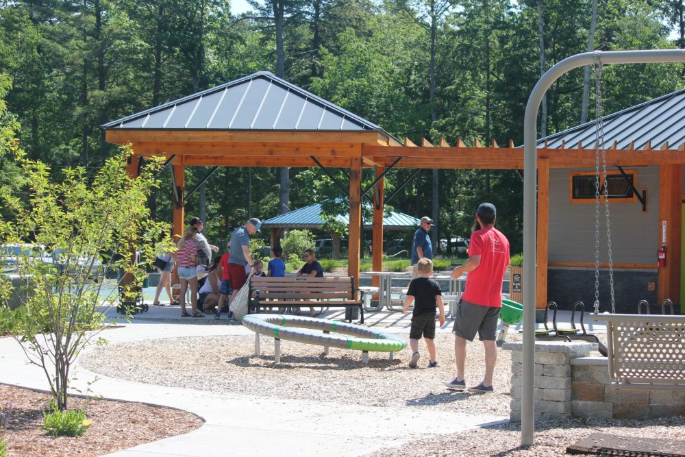 people playing at glen arbor town park playground