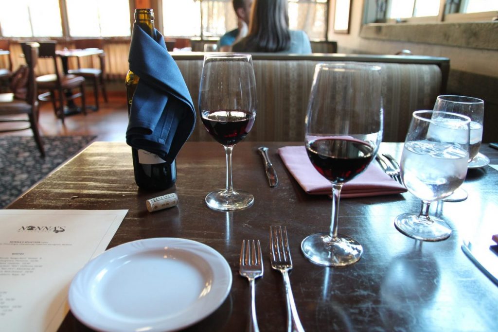 table settings, wine bottle served at Nonna's Ristorante