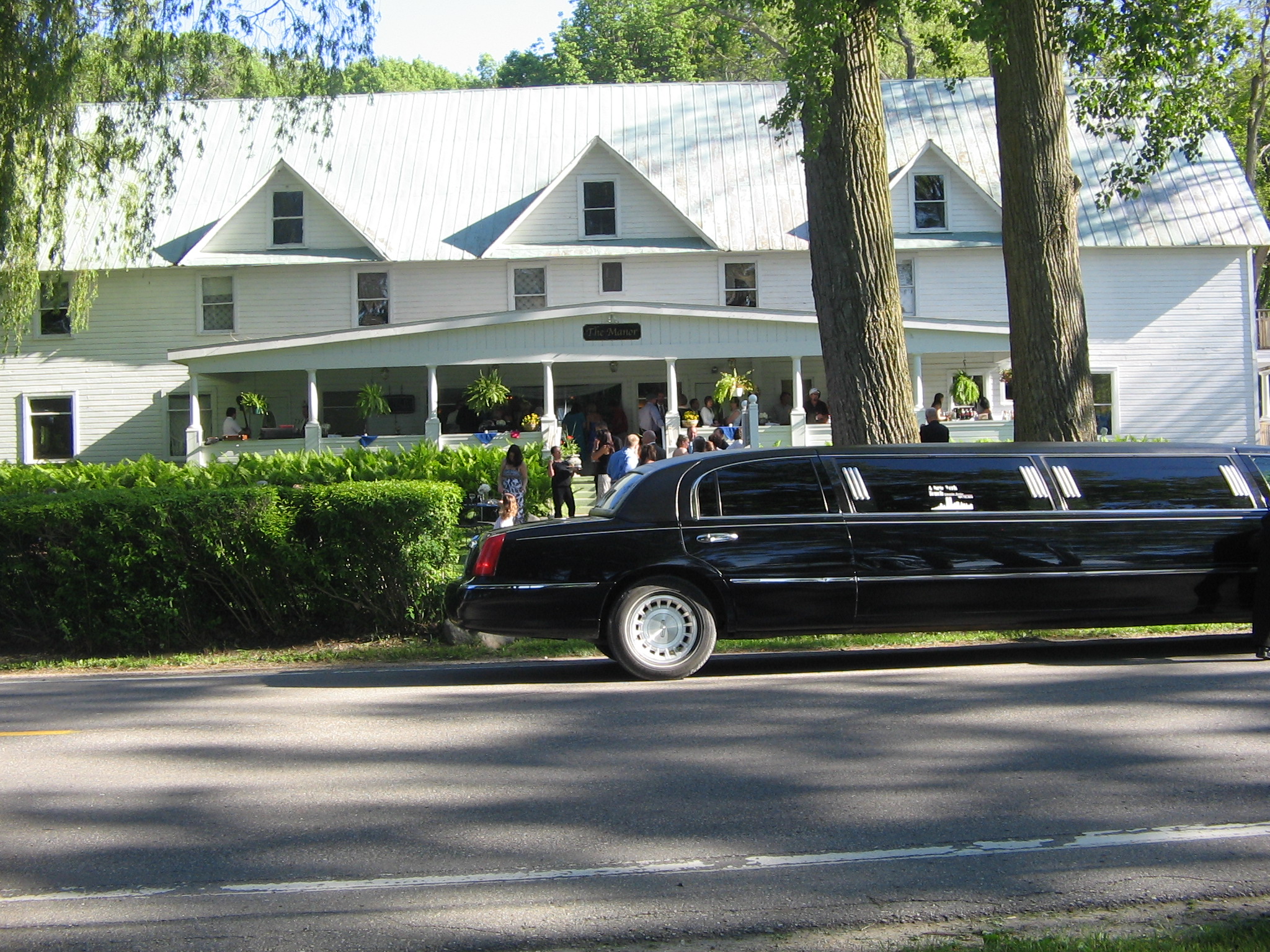 wedding reception with limo outside The Manor