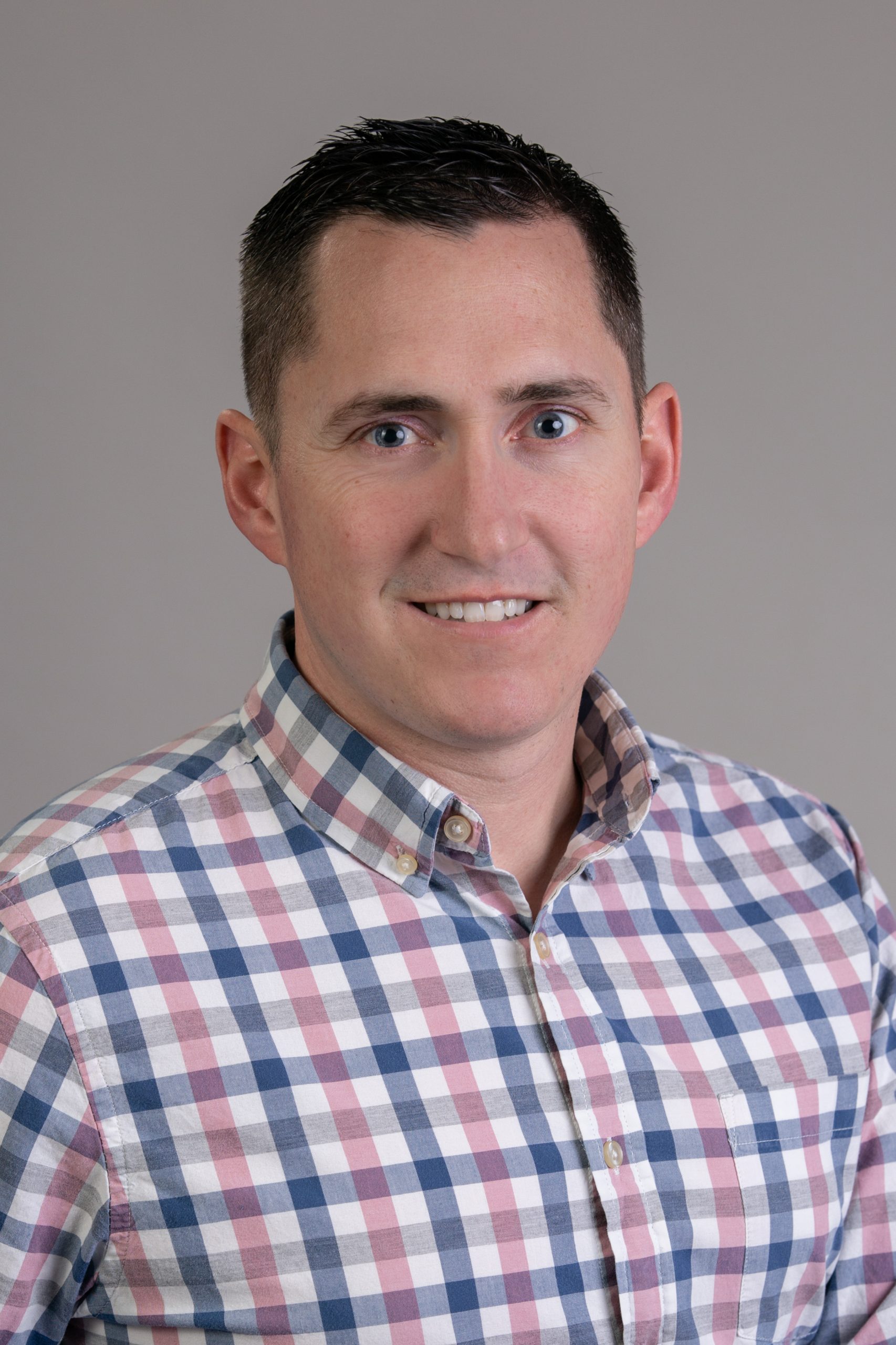 sam realtor coldwell banker headshot