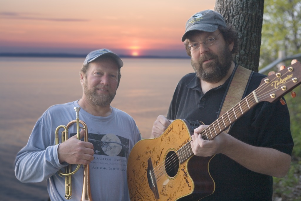 new third coast musicians posing at sunset