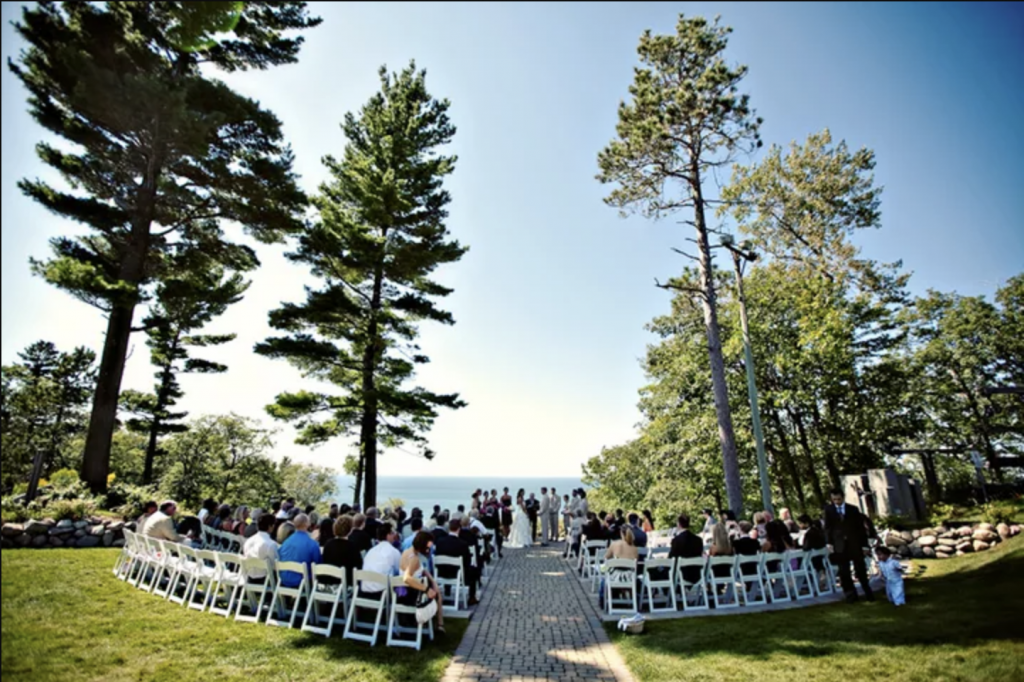 wedding ceremony at the top of the bluff overlooking Lake Michigan at The Homestead