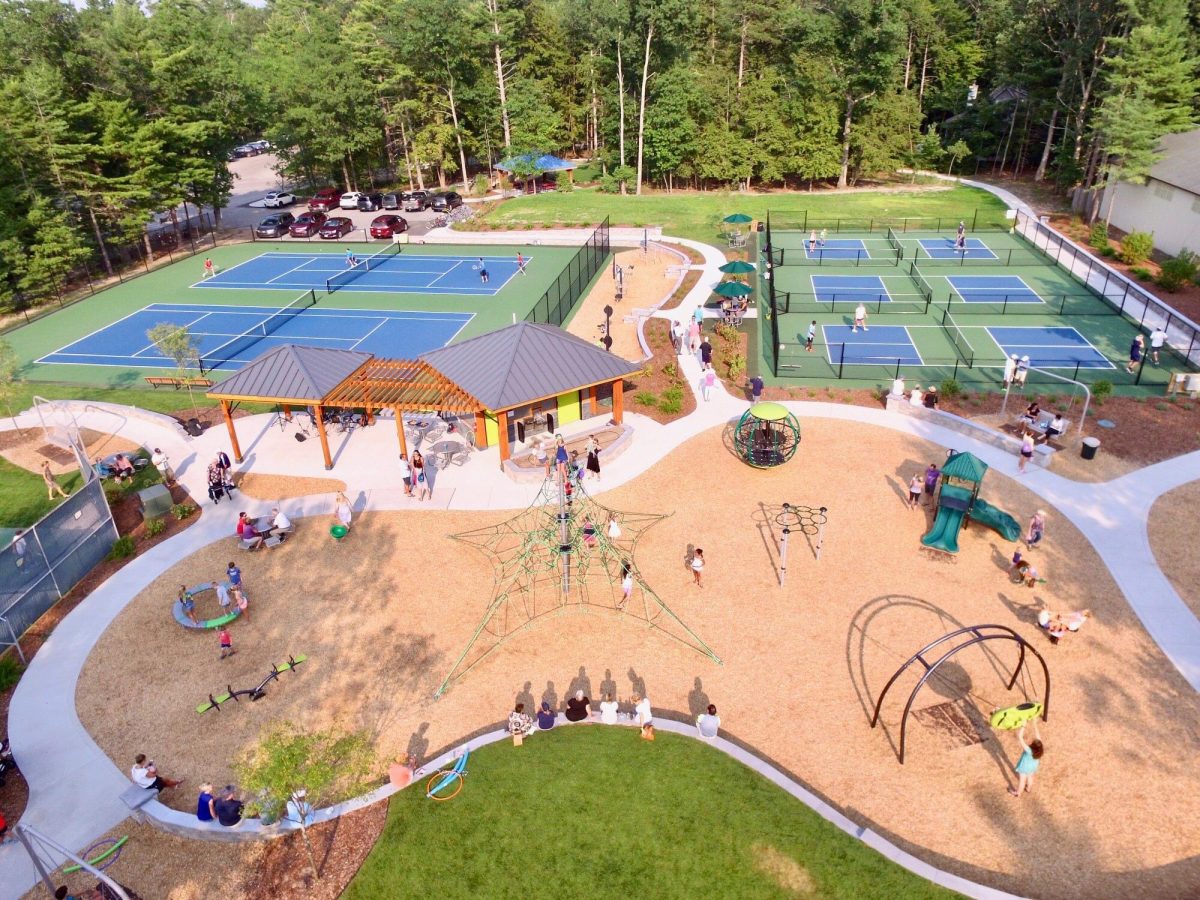 view of township park, playground tennis courts
