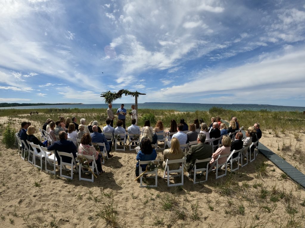wedding ceremony lake michigan beach house