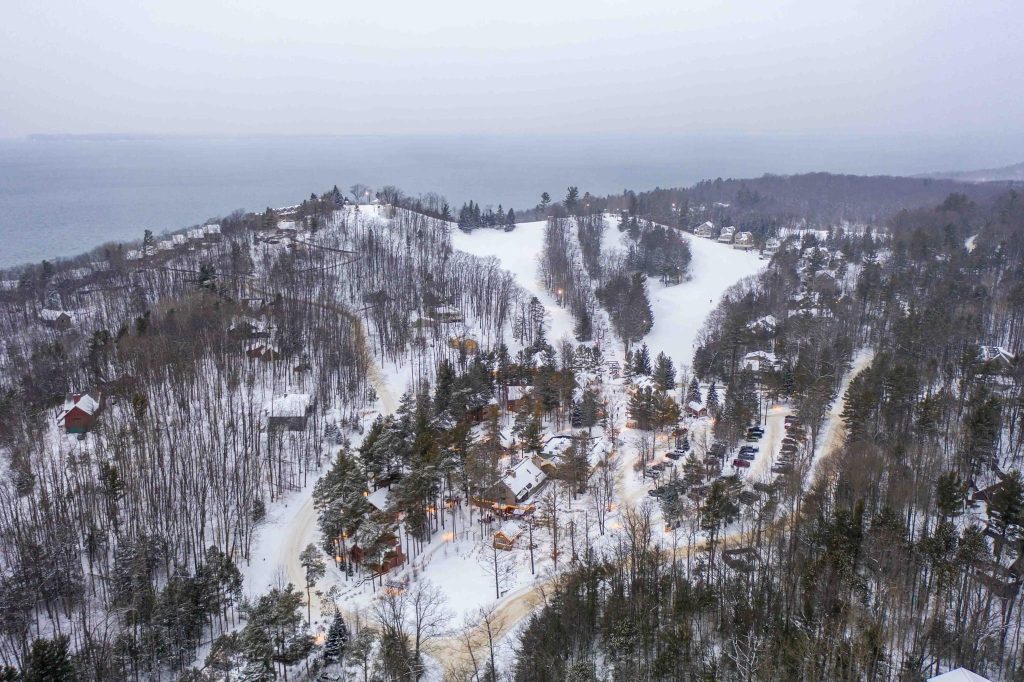 winter at the homestead in glen arbor view from the sky