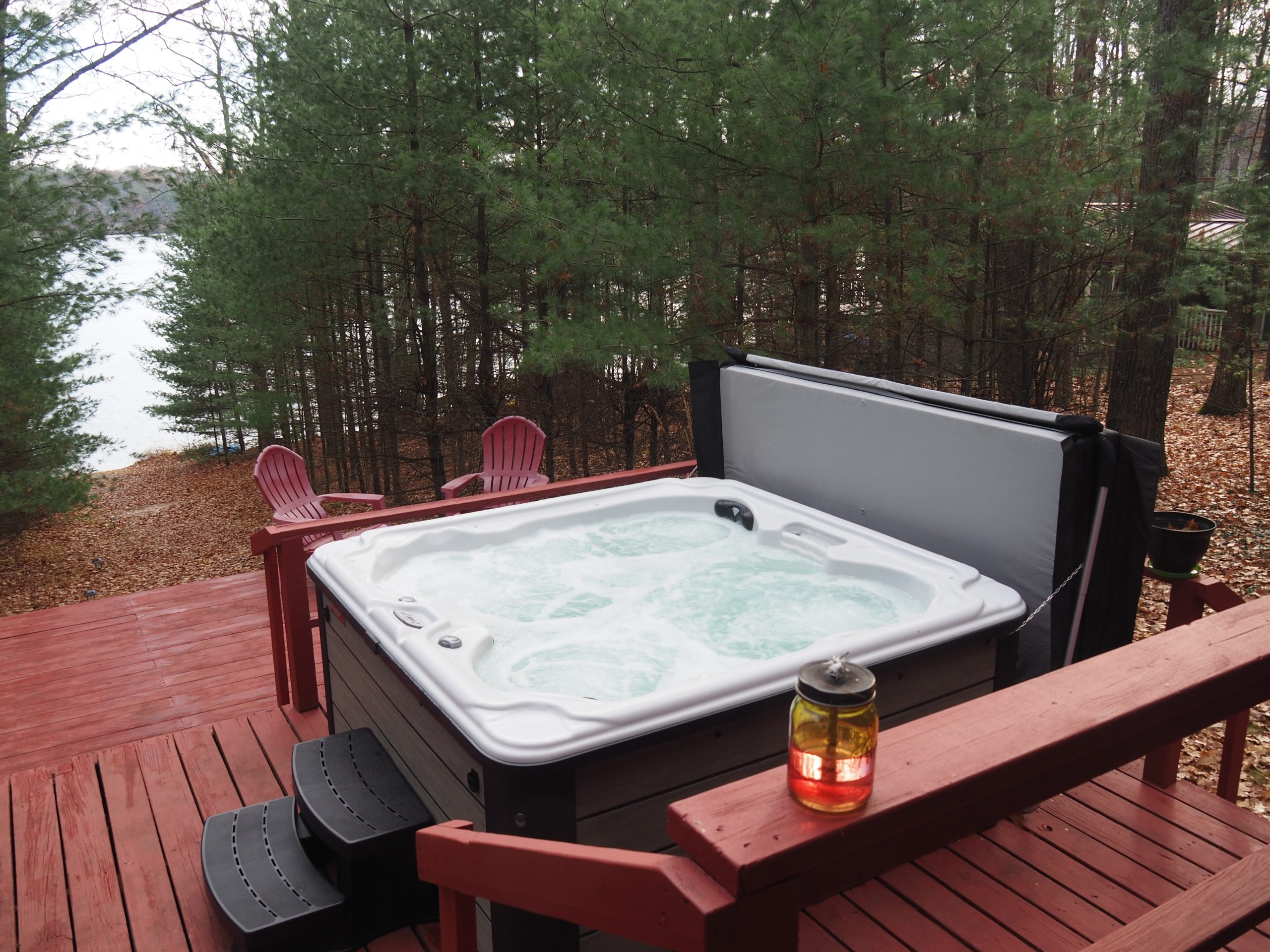 Agape Vacation Rental lakefront deck hot tub exterior view
