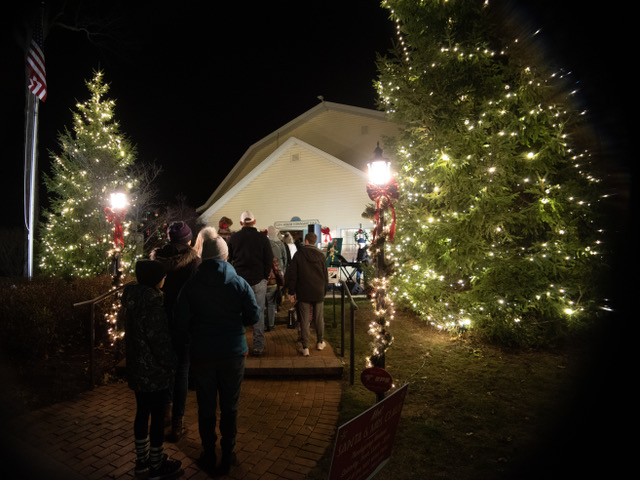 tree lighting and caroling in Glen Arbor outside town hall Thanksgiving weekend